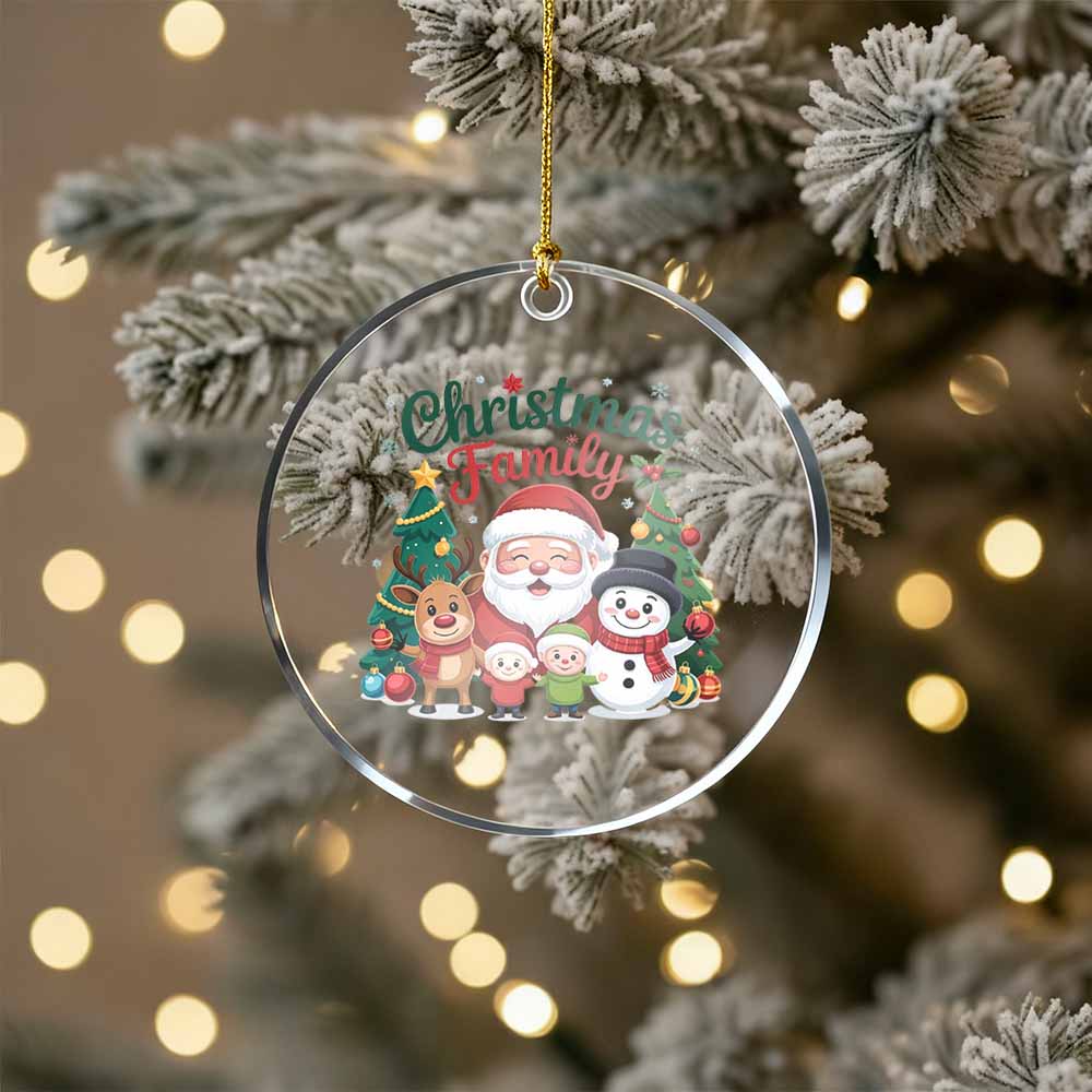 Christmas family ornament hanging on a decorated tree with lights.