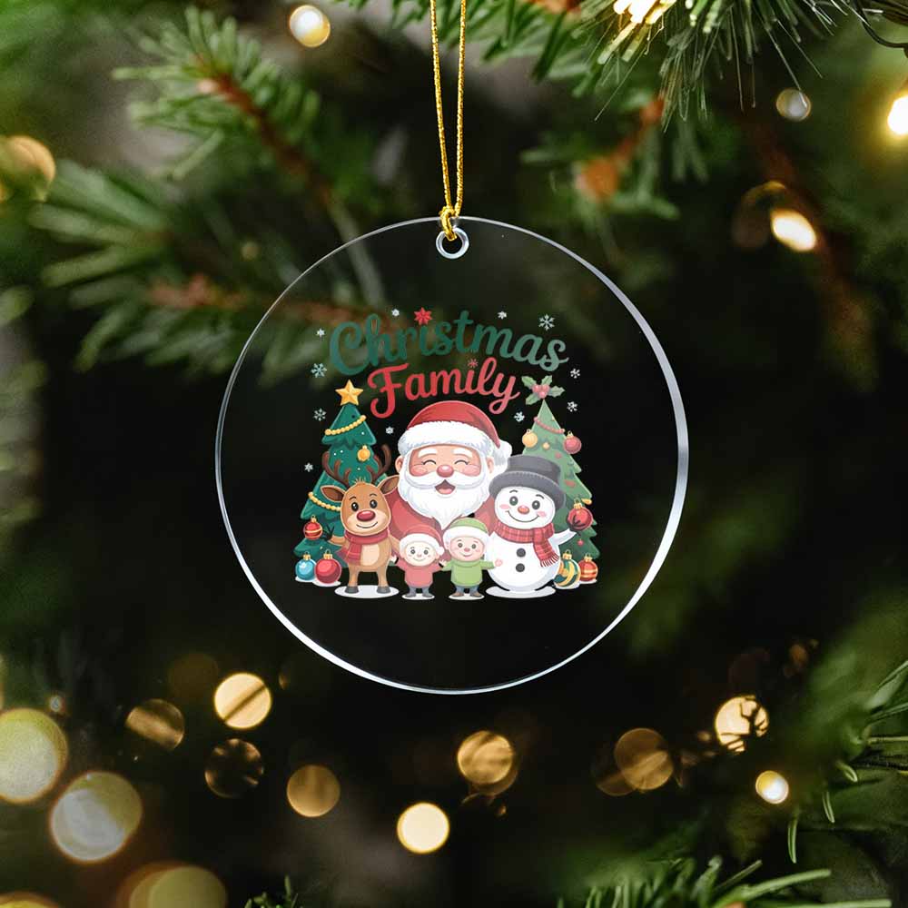 Christmas family-themed ornament hanging on a tree with blurred lights in the background
