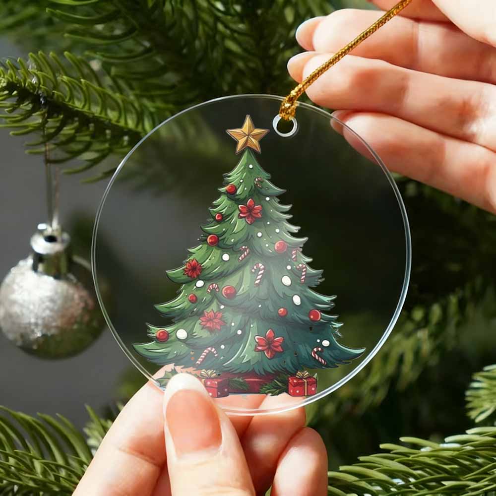 Decorative Christmas tree ornament with a star on top, held by hands against a Christmas tree background.