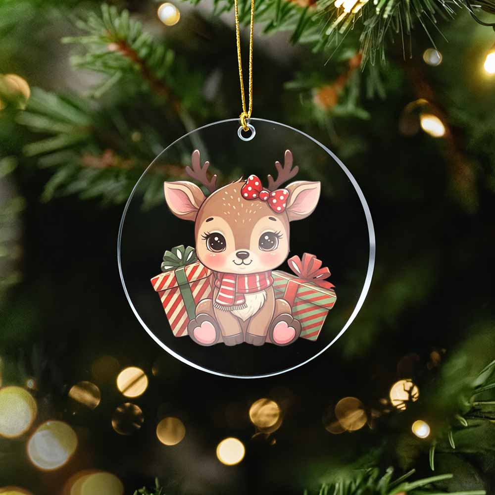 Christmas ornament with a reindeer design on a tree with lights.