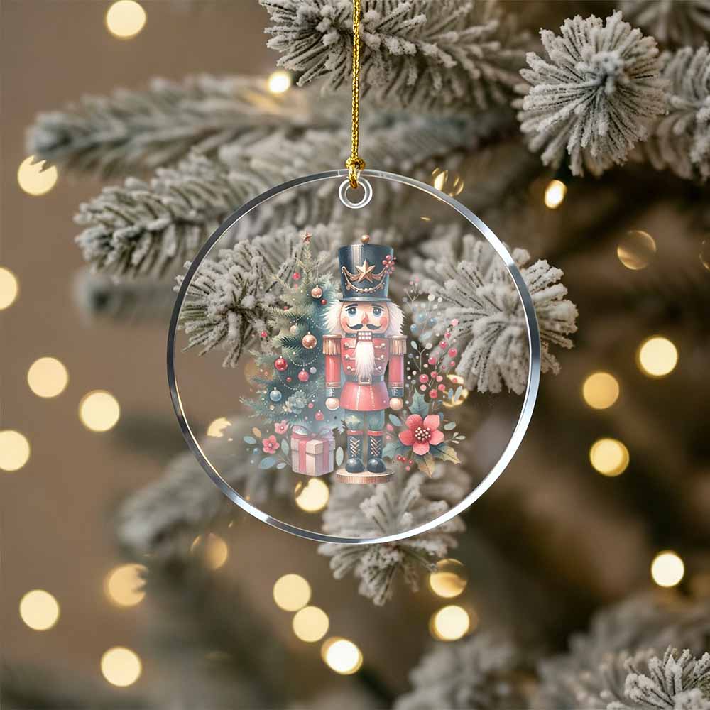 Decorative Christmas ornament with a nutcracker and tree on a blurred Christmas tree background.