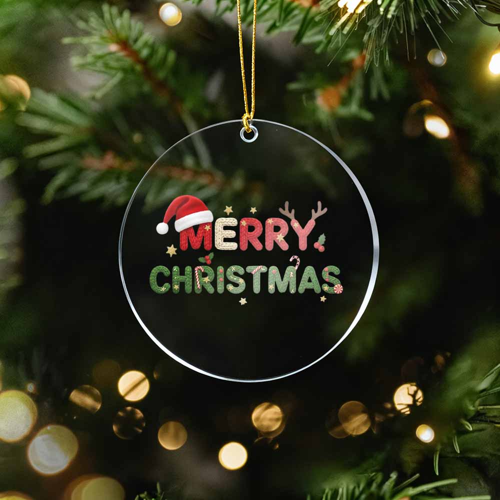 Clear acrylic ornament with 'Merry Christmas' text on a Christmas tree.