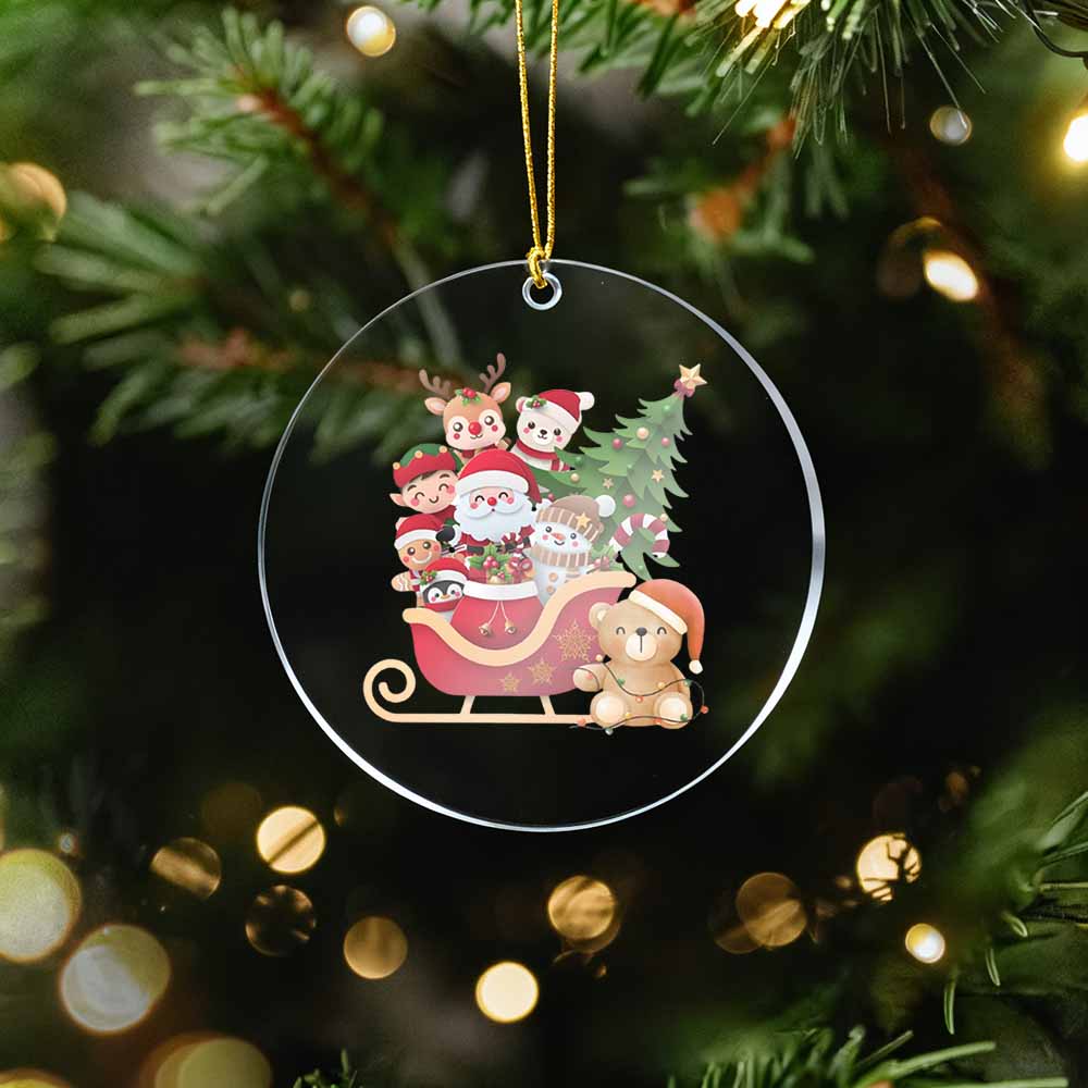 Decorative Christmas ornament with Santa Claus and reindeer in a sleigh, surrounded by trees and lights.