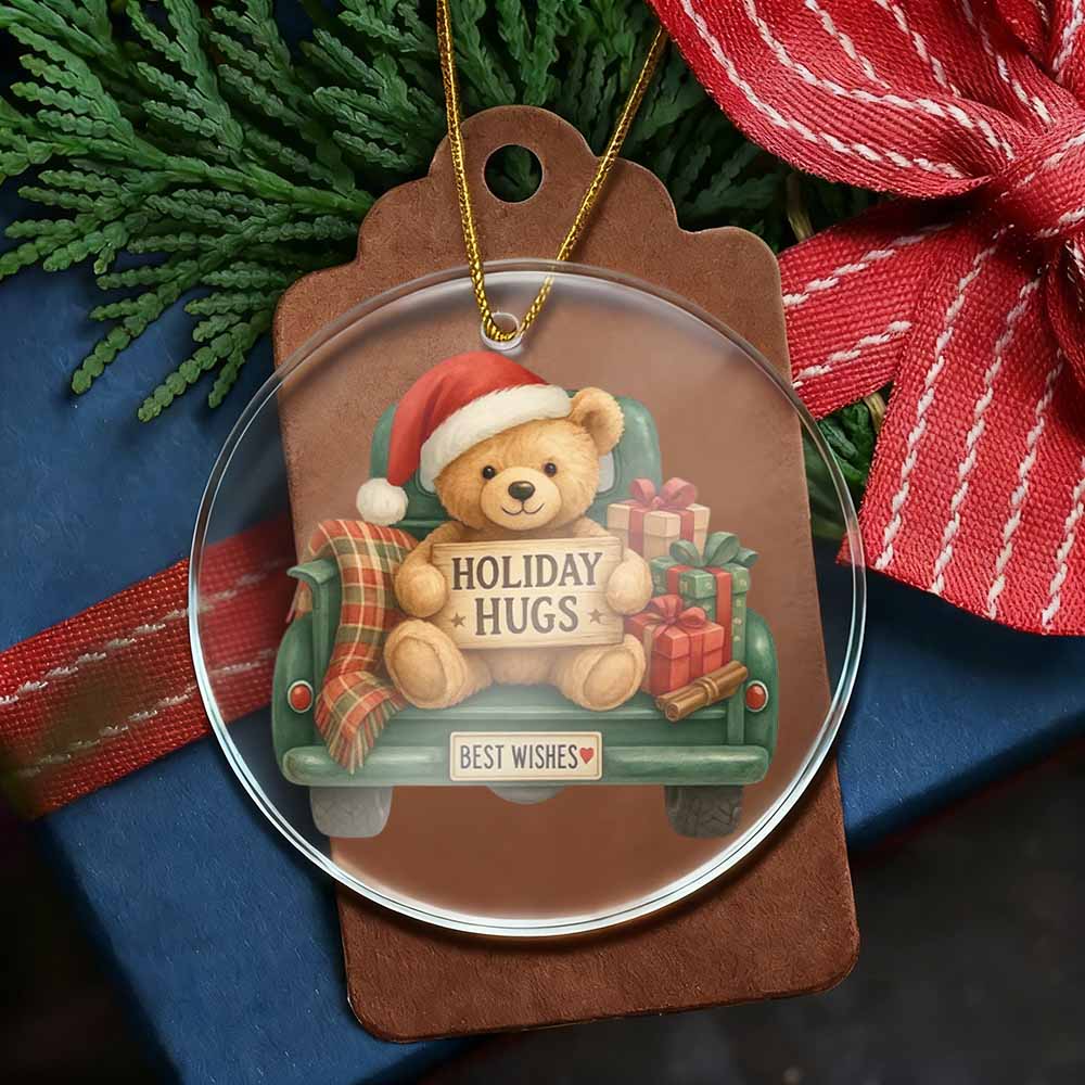 Christmas ornament with a teddy bear and 'Holiday Hugs' text on a brown tag.
