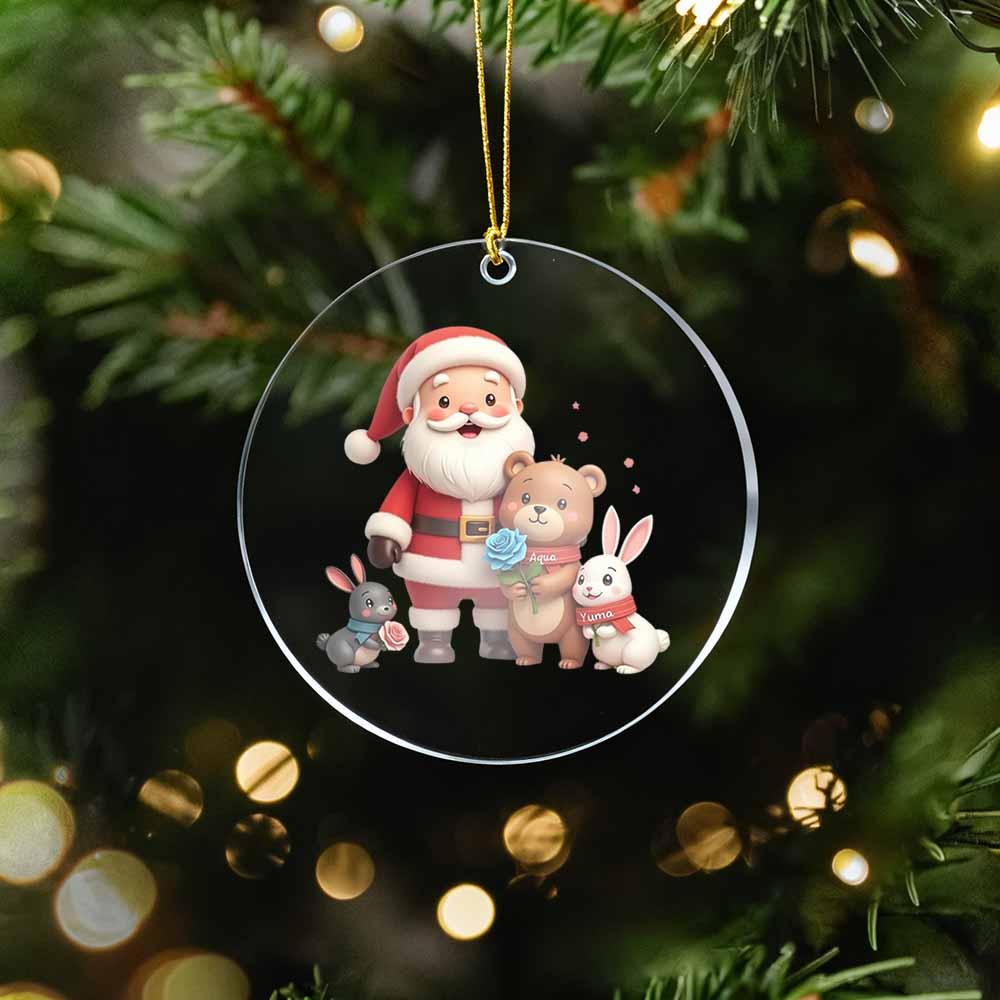 Christmas ornament with Santa Claus and three bears on a tree with lights.
